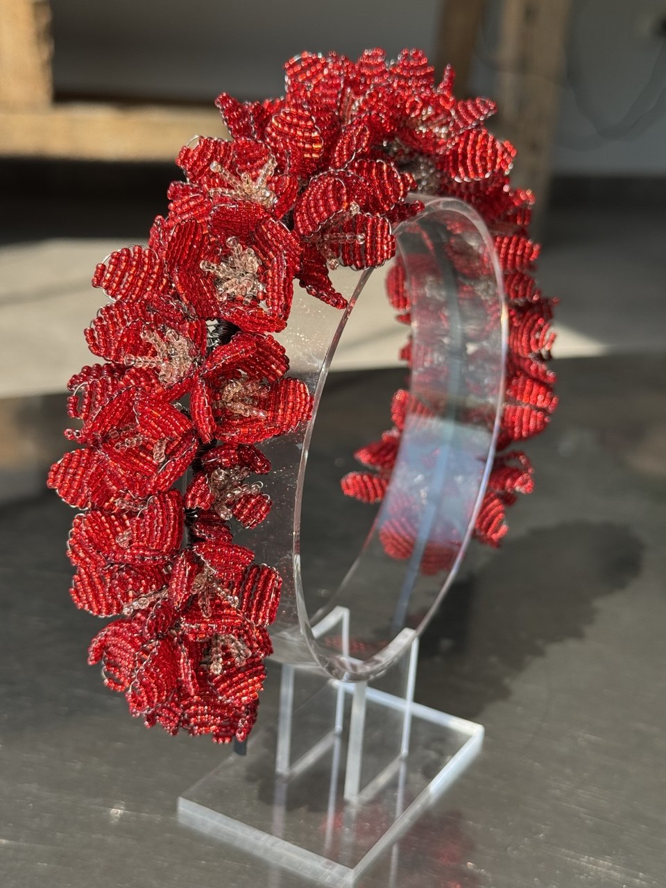 A red beaded floral headband  | Victoria's Accessories